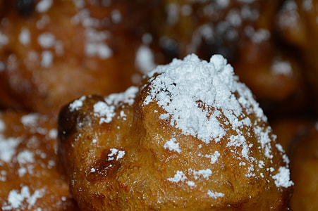 closeup photo of baked food with white powder on top thumbnail