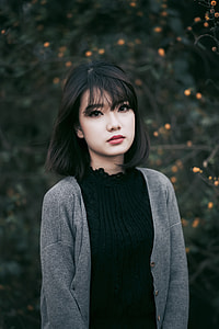 woman wearing gray button-up cardigan thumbnail