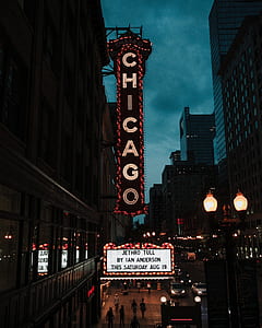 lightened Chicago neon light signage during nighttime thumbnail