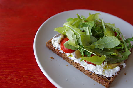 Baked Pastry With Cream and Salad on Top thumbnail