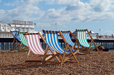 empty chairs near body of water thumbnail