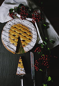 sliced pie on table near cake knife thumbnail