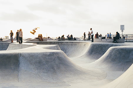people near skating rink during daytime thumbnail