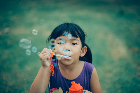 girl blowing bubbles thumbnail