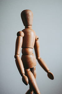 close up photo of brown wooden dummy thumbnail
