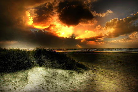 body of water under cloudy sky thumbnail