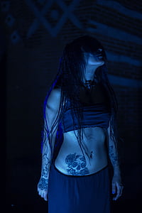 woman wearing crop-top and skirt looking up thumbnail