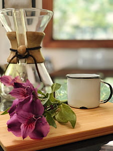 White Ceramic Mug on Brown Table thumbnail