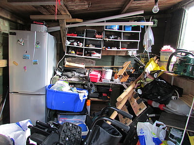 blue plastic storage box beside white bottom mount refrigerator thumbnail
