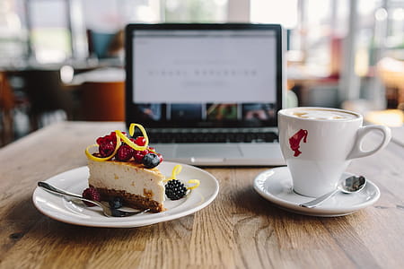 Working in a restaurant: Macbook, Cheese Cake and Cup of Coffee thumbnail
