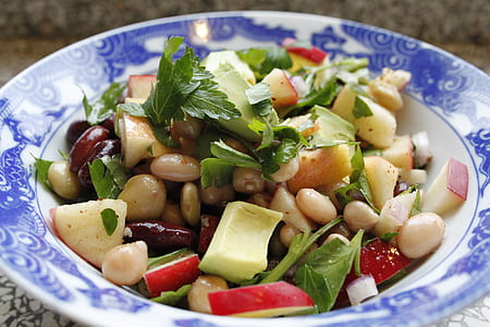 fruit salad on round blue and white plate thumbnail