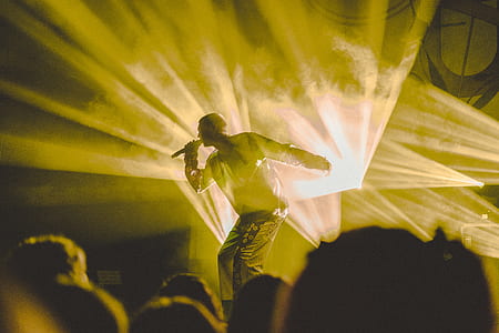 man holding microphone at the stage thumbnail