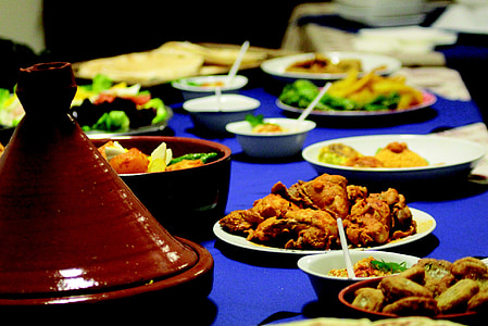 selective focus photography of fried chicken on blue table thumbnail