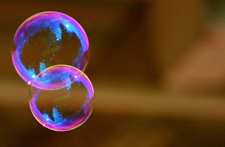 selective focus photography of two iridescent bubbles thumbnail