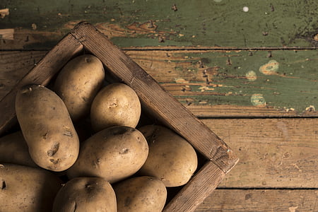 potatoes in brown wooden crate thumbnail
