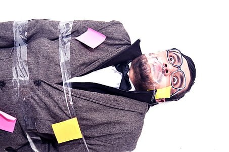 man covered with adhesive tape and sticky notes thumbnail