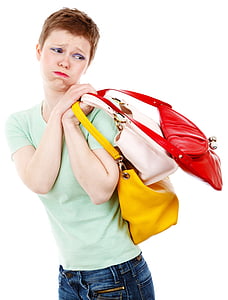 woman carrying three leather handbags thumbnail