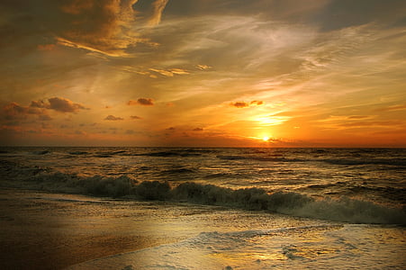 orange horizon with waves of ocean thumbnail