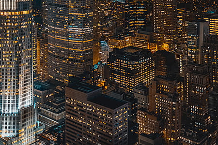 aerial photography of high-rise buildings at nighttime thumbnail