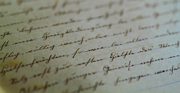 closeup photo of cursive writing thumbnail