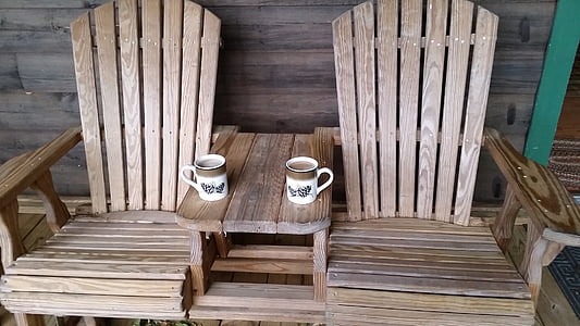 two brown wooden adirondack chairs thumbnail