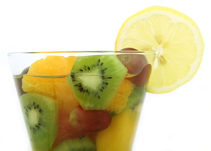 clear beverage glass filled with fruits thumbnail