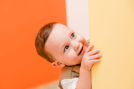 baby boy holding yellow all thumbnail