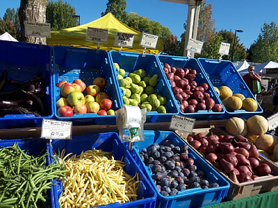 fruits and vegetables in blue crates thumbnail