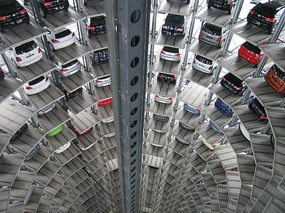 assorted-color vehicle tower parking lot thumbnail