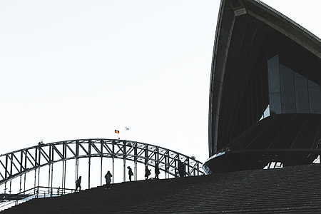 photo of people near concrete building thumbnail
