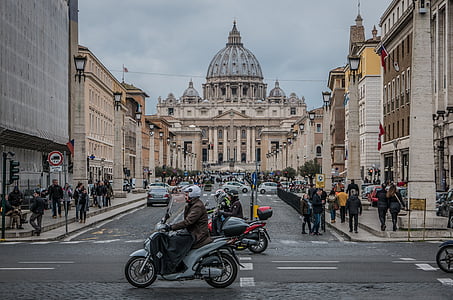 person riding motorcycle on street thumbnail