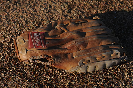 brown Rawlings leather baseball mitt thumbnail