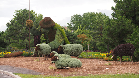 green and brown lamb statues thumbnail