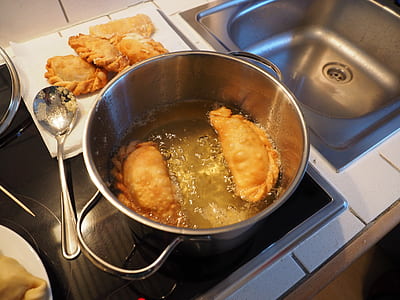 empanada in round grey metal pot thumbnail