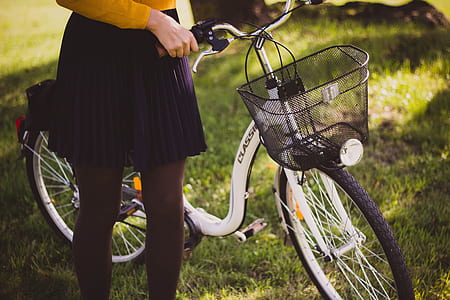 person holding bike handlebar at daytime thumbnail