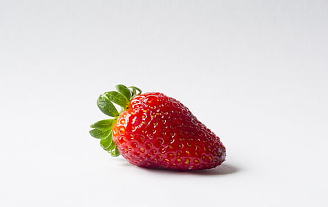 strawberry on white surface thumbnail