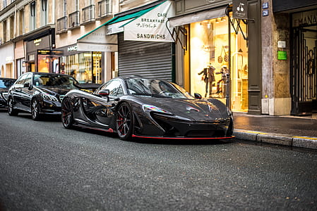 super car at beside the sidewalk thumbnail