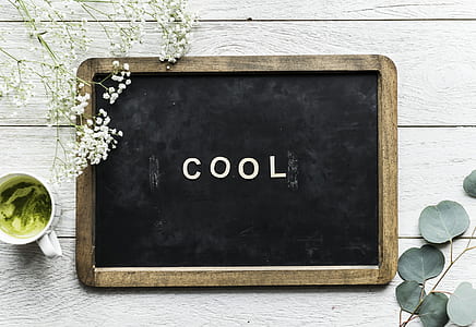 rectangular brown wooden framed black board with cool signage thumbnail