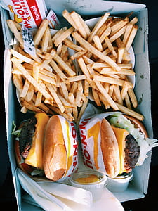 two burgers and four potato fries thumbnail