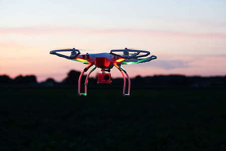 white DJI Phantom 3 Standard mid-flight thumbnail