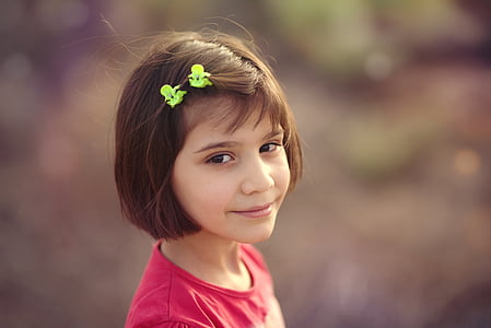 selective photography of smiling girl thumbnail