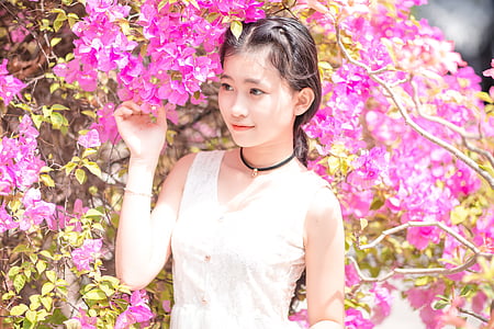 woman holding flowers thumbnail