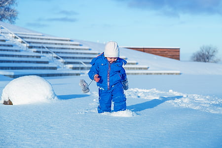 toddler walking on snowfield thumbnail
