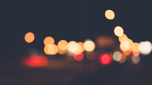 bokeh photography of orange, red, and black lights thumbnail