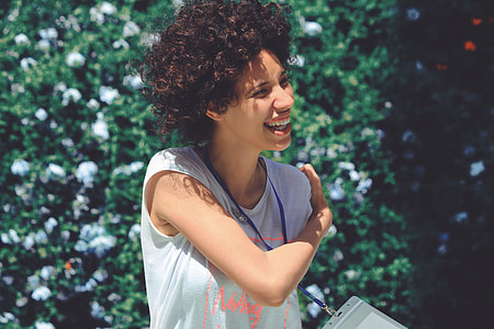 person wearing white V-neck t-shirt thumbnail