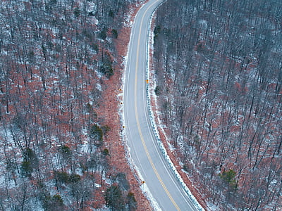 aerial view photography of winding road thumbnail