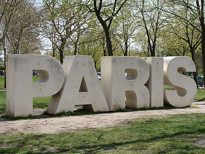 gray Paris freestanding letters near trees at daytime thumbnail