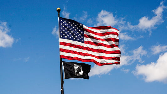 photo of U.S. America Flag on pole during daytime thumbnail