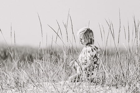 children sitting on grass thumbnail