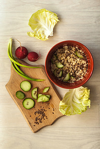 stir rice on bowl beside cabbage thumbnail